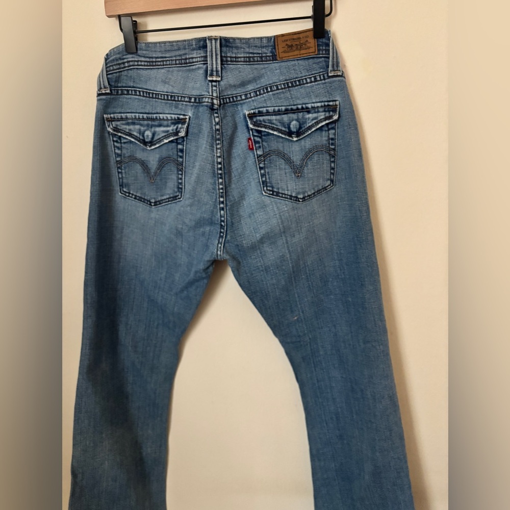 Levis 542 low flare jeans see 10m Y2K flap pocket bootcut denim medium wash